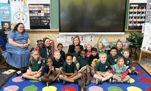 Gov. Reynolds with children at school