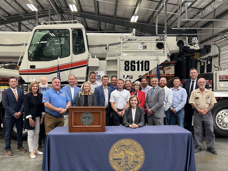 Governor Reynolds signing the UI reform bill